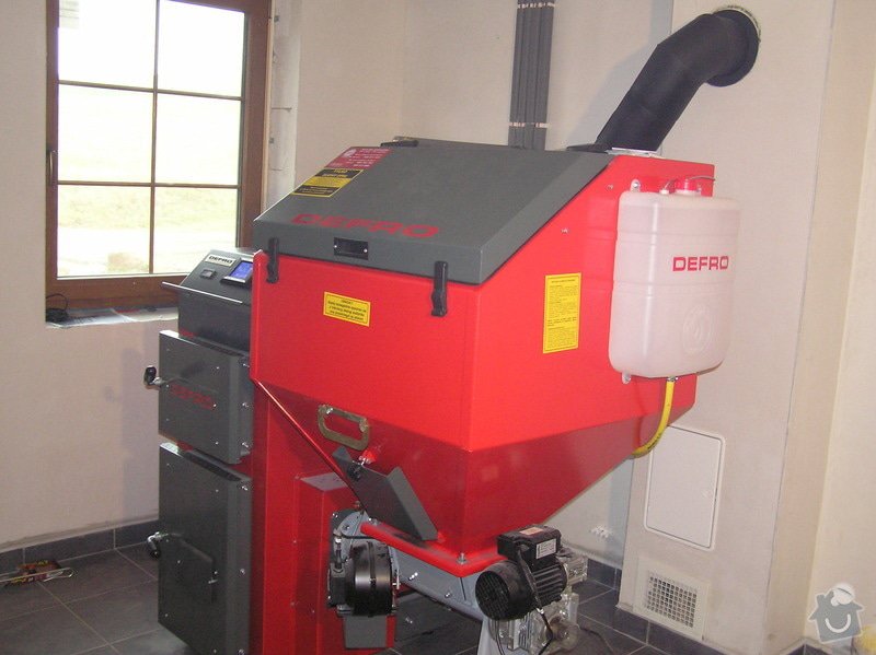 Instalace automatického kotle na tuhá paliva DEFRO AGRO Uni 15 kW v novostavbě RD: 024