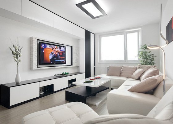 Moderní kuchyň v panelovém domě, minimalistický obývací pokoj a předsíň